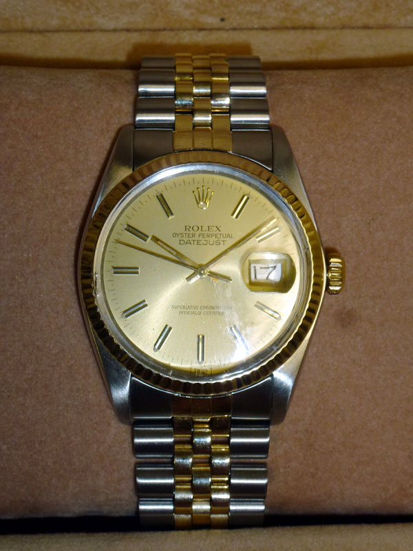 Stainless steel case, with factory two-tone 18 CT yellow gold and stainless steel bracelet.