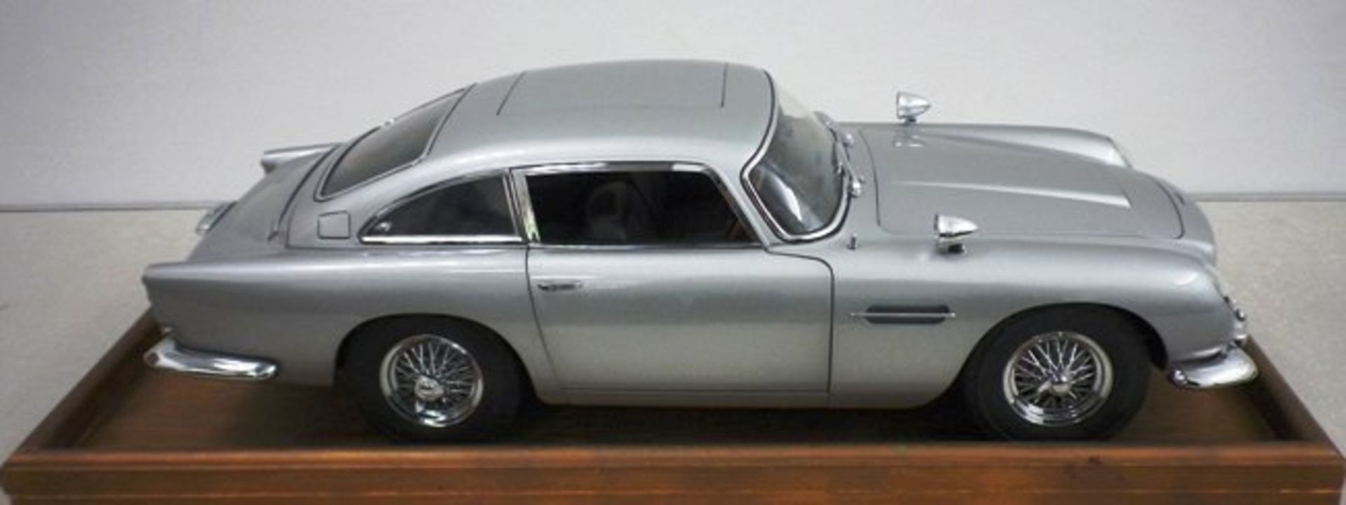 James Bond Aston Martin DB5.Estimate : £850 - £1,000 A large 1/8 scale, hand-built model of the