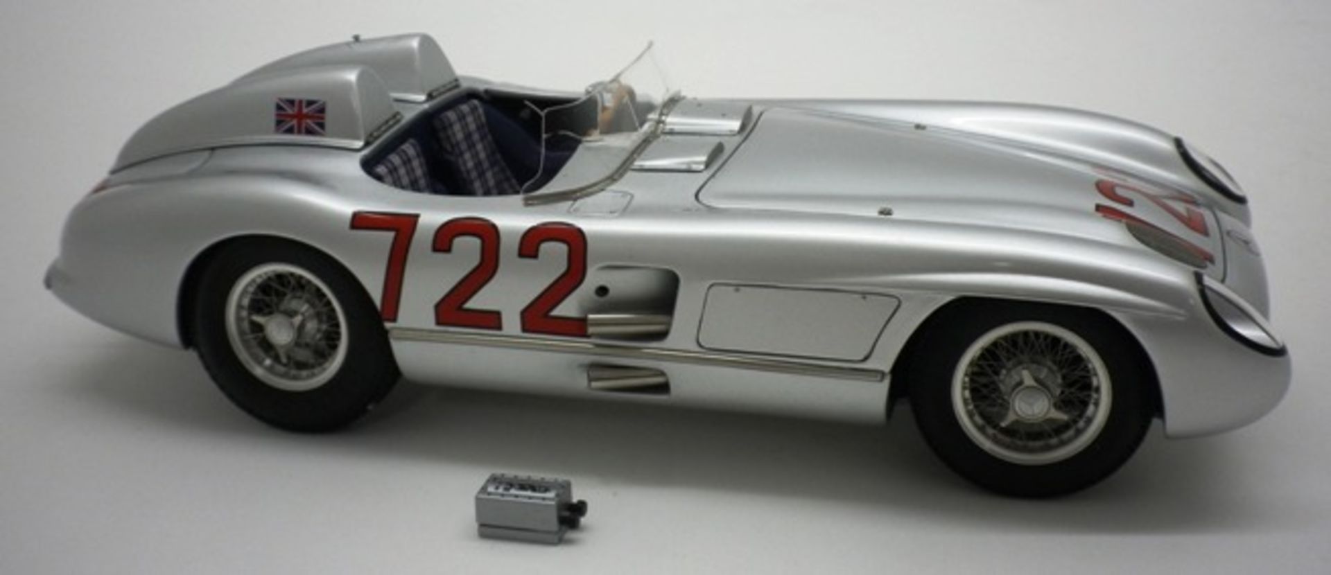 1955 Mercedes-Benz 300SLR.Estimate : £250 - £275 A 1/18 scale model by CMC of the 1955 Mercedes-Benz