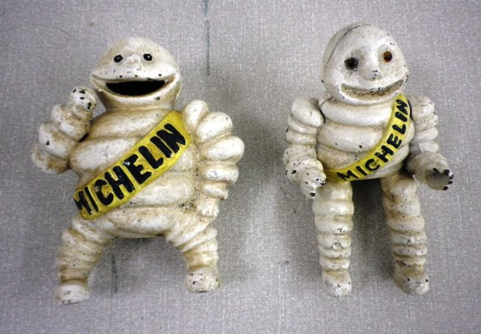 Michelin men.Estimate : No Reserve Two cast metal Michelin men and a cast metal Harley Davidson