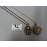 Silver locket on chain, and an unusual silver pend