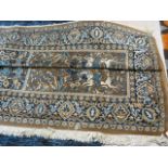 A Large blue ground rug