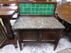 A low Marble topped washstand with inlay