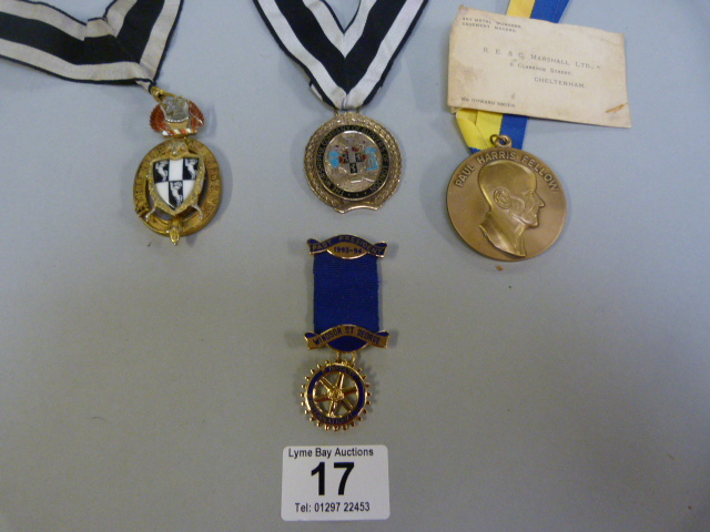 A masonic medal and three others