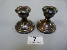 Two hallmarked silved candle stick holders