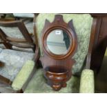 Small round mirror with well under