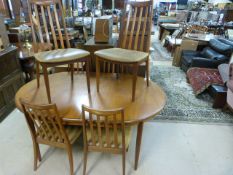 G plan teak extending table and six chairs