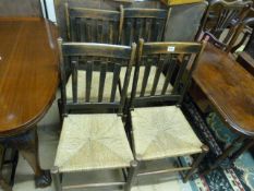 Set of four rush seated Art & Crafts chairs