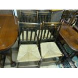 Set of four rush seated Art & Crafts chairs