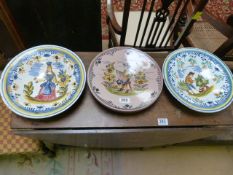 Four continental pottery plates