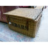 A large wicker laundry basket