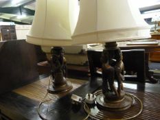 Two table lamps with African carvings