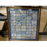 Framed cigarette cards of planes