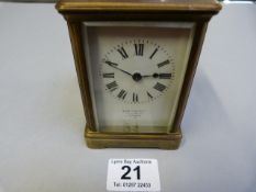 Brass carriage clock by S Smith & sons Ltd.