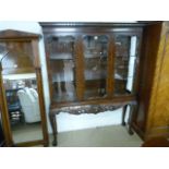 Waring & Gillow display cabinet, the base embossed