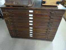 A Stained pine plan chest