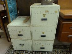 Five singular filing drawers