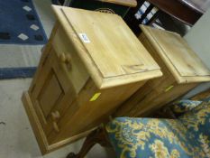 Two pine bedside cabinets