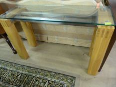A modern glass topped console table