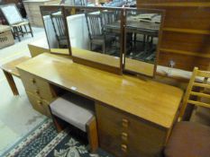 A Stag dressing table stool and one other
