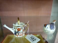 A Royal crown derby watering can and a bird