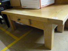 Light oak coffee table with drawer