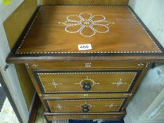 An inlaid mother of pearl chest of two drawers