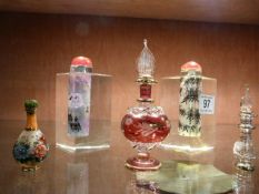 Five various scent bottles