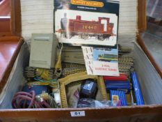 Vintage suitcase containing various Hornby Dublo track, signals, transformers etc