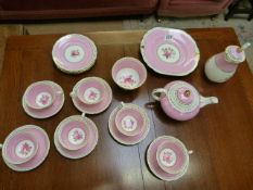 Part pink decorative tea set with hot water jug