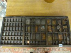 A printers tray with various plates