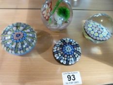 Four various paperweights inc Murano