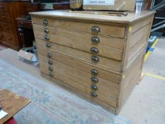 A pine 8 drawer plan chest