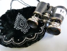 A Pair of Jumelle marine Paris opera glasses