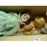 A Composite doll and a bisque headed doll A/F