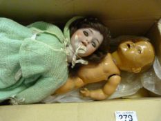 A Composite doll and a bisque headed doll A/F
