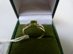 9ct Peridot and diamond ring