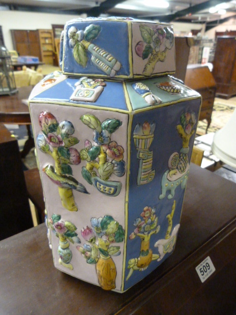 A Large painted jar and lid