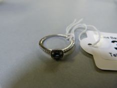 Sapphire and diamond ring set in 18ct white gold