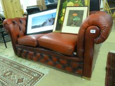 A Red Chesterfield Sofa