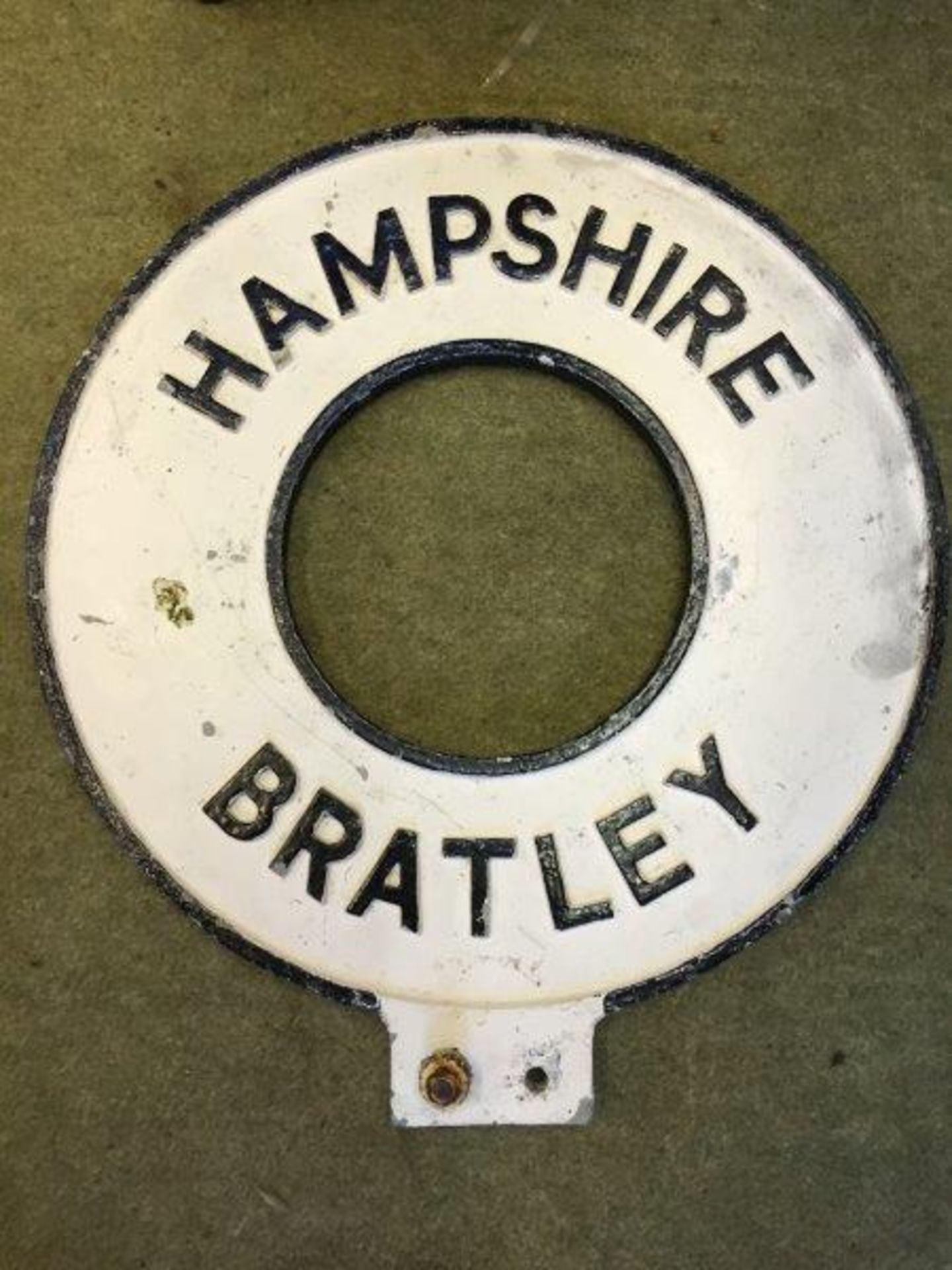 A circular cast aluminium village green sign for Bratley of Hampshire, 15" diameter. - Image 2 of 2
