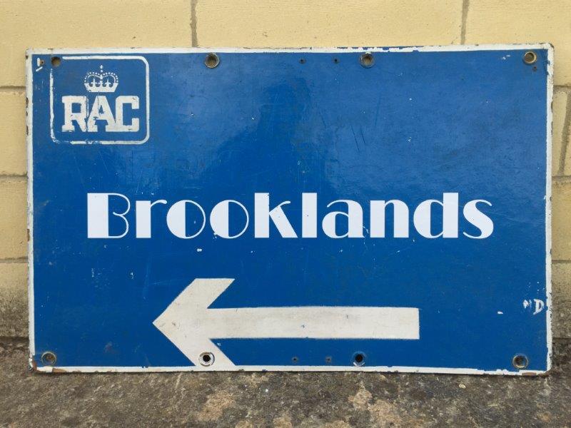 An RAC Brooklands directional road sign with brass eyelets, 35 x 22".