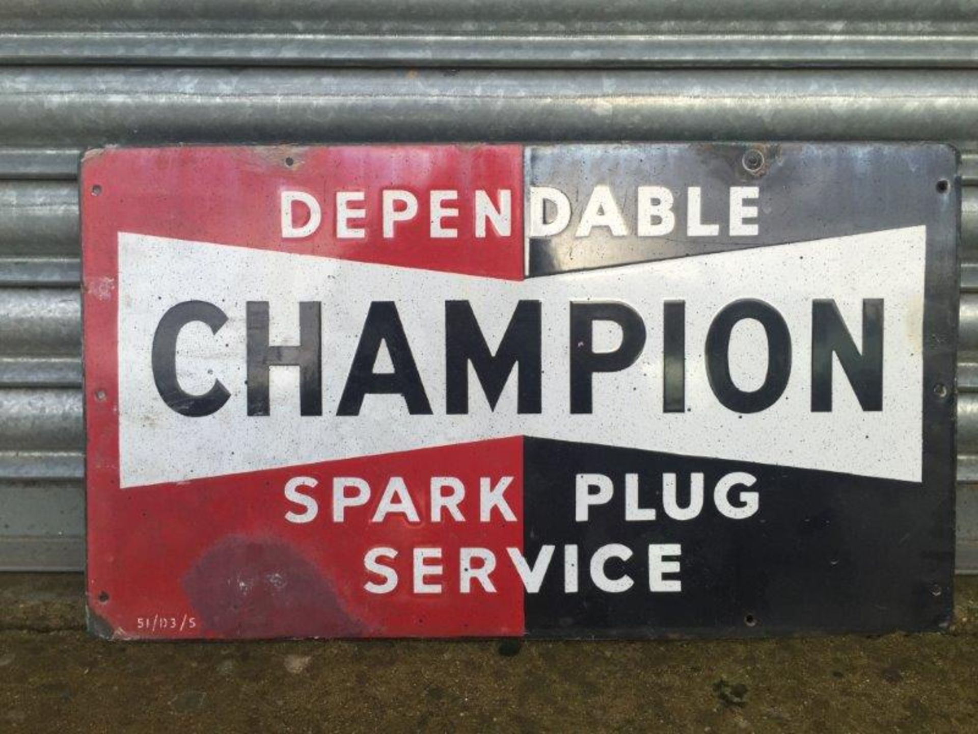 A Champion Dependable Spark Plugs Service rectangular enamel sign, dated 1951 with some