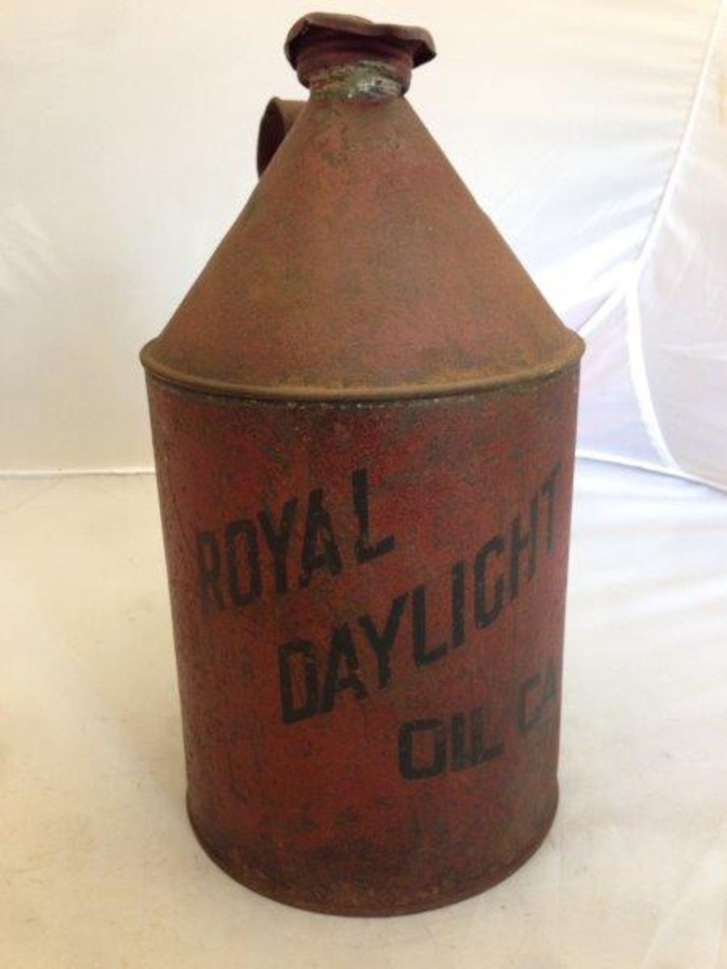 An Esso Royal Daylight Paraffin cylindrical can with cap.