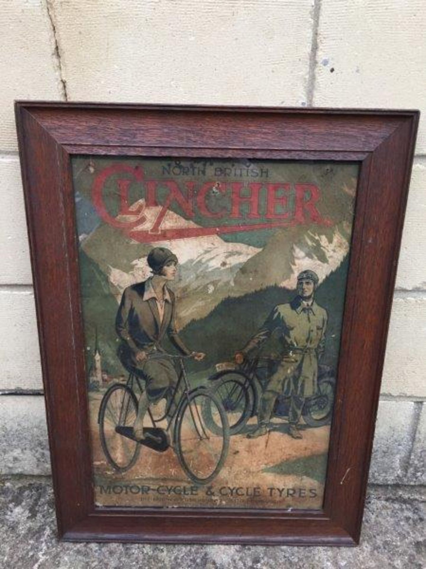 An oak framed and glazed North British Clincher Motorcycle and Cycle Tyres pictorial showcard