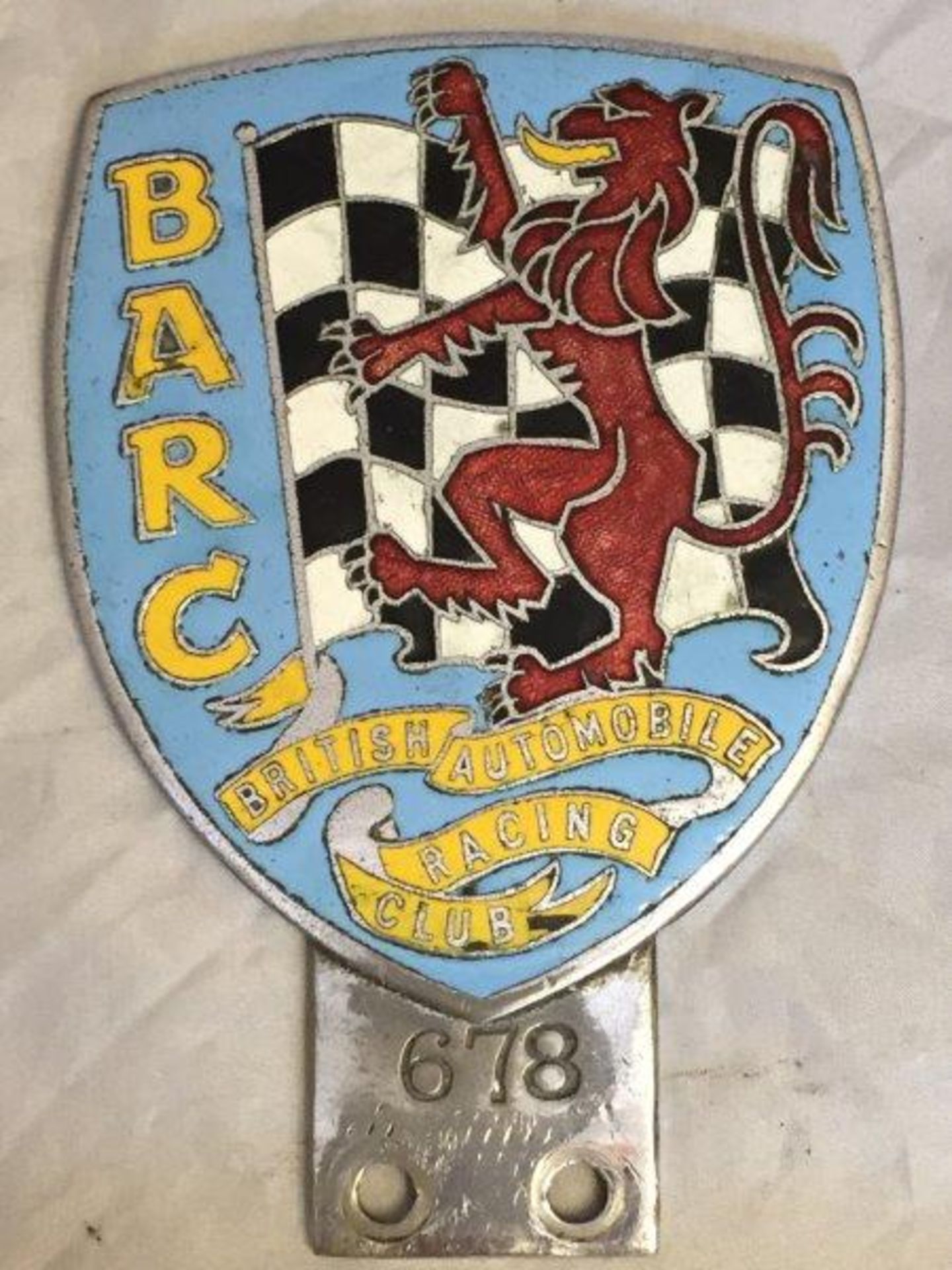 A BARC enamel car badge, no. 678.