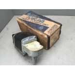 A boxed new old stock Lucas Factory Exchange unit, S/wiper motor type SW4, 12 volt.