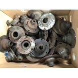 Two boxes of assorted hubs and Girling brake parts.