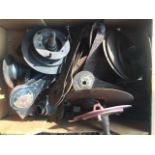 A box of Austin 7 brake parts, hubs, shock absorber parts etc.