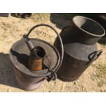 A small Shell oil measure, a fire bucket and a milk churn.